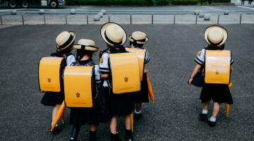 Children walking on fertile ground